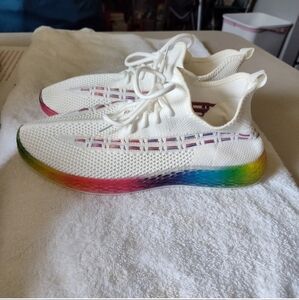 White sneakers with colorful soles